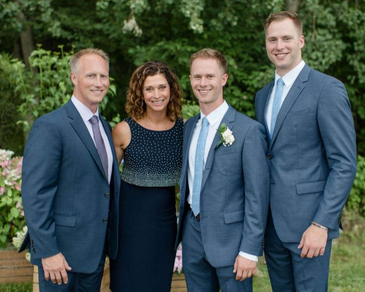 Calahan Skogman with his father Wade Skogman, mother Stefani Skogman, and brother Clayton Skogman