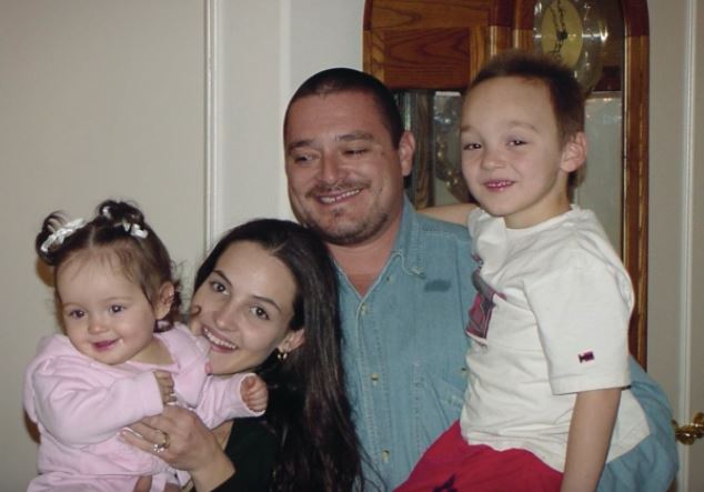 Crystal Theobald with her kids and husband