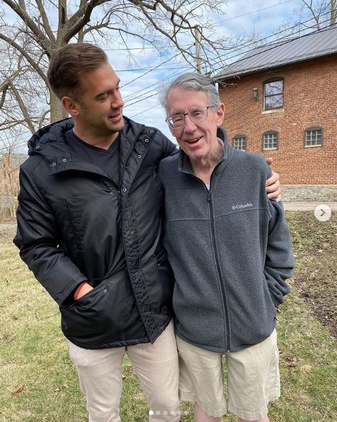 Lewis Howes with his father.