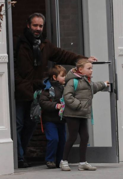 Mia Honey Threapleton and Joe Mendes with their step father Sam Mendes