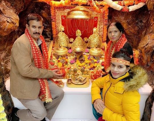 Mokshita Raaghav with her parents at Mata Vaishno Devi Temple