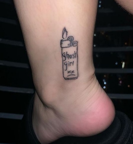 Mulan Vuitton has a tattoo