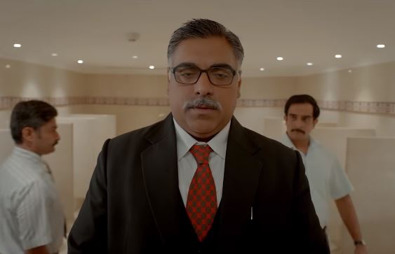 Ram Kapoor as Ashok Mirchandani in The Big Bull
