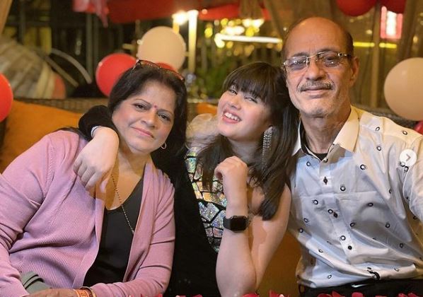 Riva Arora with her grandparents