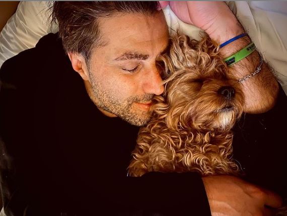 Adam Ray with his dog