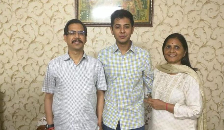 Akshat Jain with his father and mother