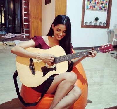 Alice Kaushik loves to play guitar