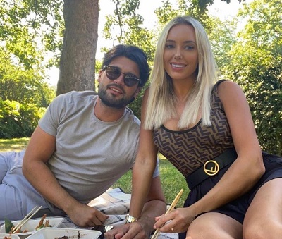 Amber Turner with Dan Edgar while celebrating their anniversary on picnic