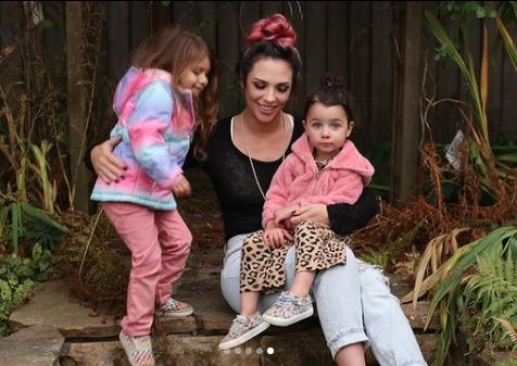 Avery Warner with her daughters Scarlett and Silver