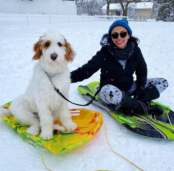 Cherie Lily with her pet dog