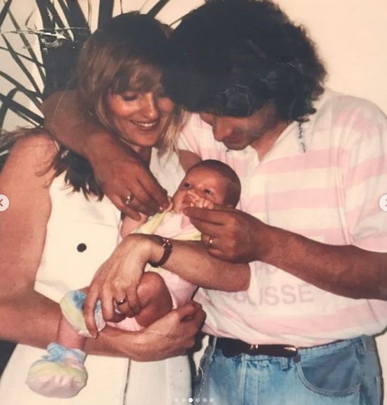 Childhood image of Georgia Kousoulou with her parents