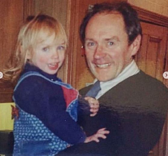 Childhood image of Becky Boston with her father