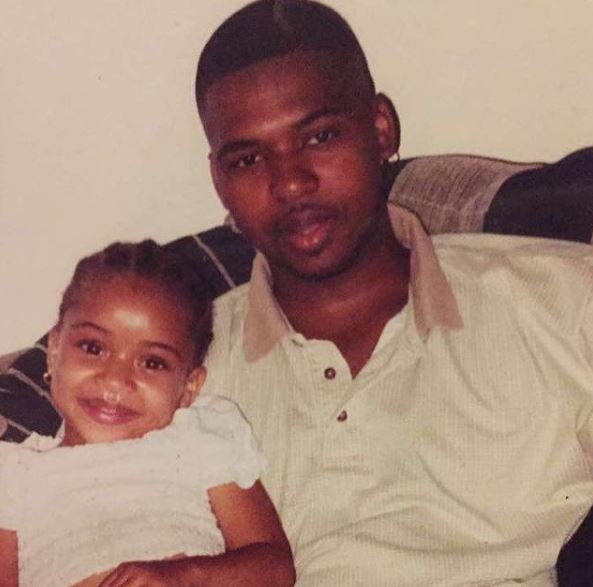 Childhood photo of India Royale with her father