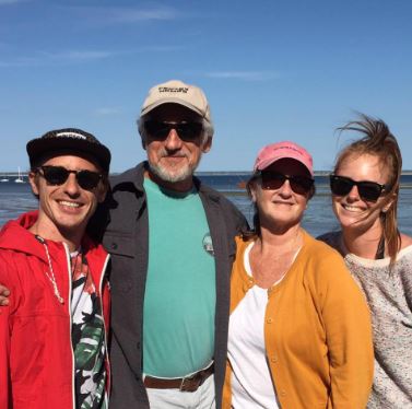 Dillon Buss with his father Steve Buss , mother Patti Lynch Buss, and sister Casey Buss