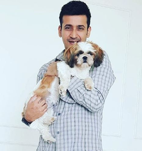 Harmeet Singh with his pet dog