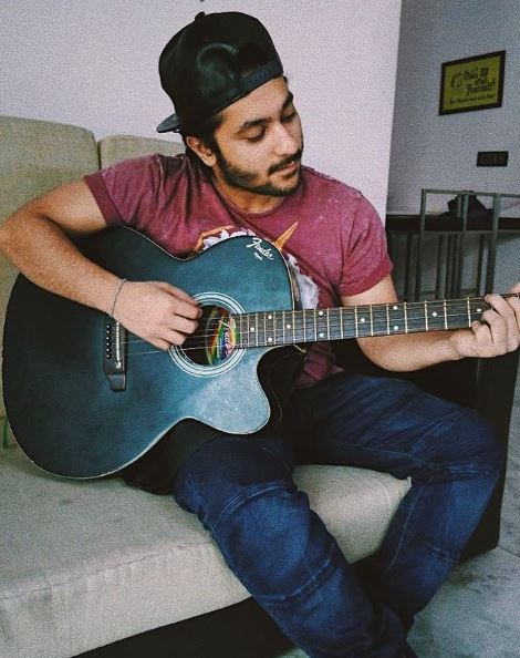 Harsh Beniwal loves to play guitar