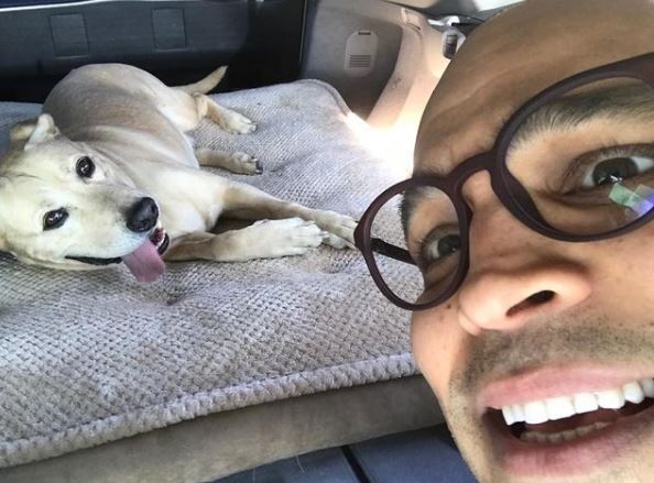Jimmy Gonzales with his pet dog