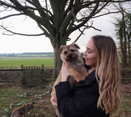 Kate Elisabeth with her pet dog