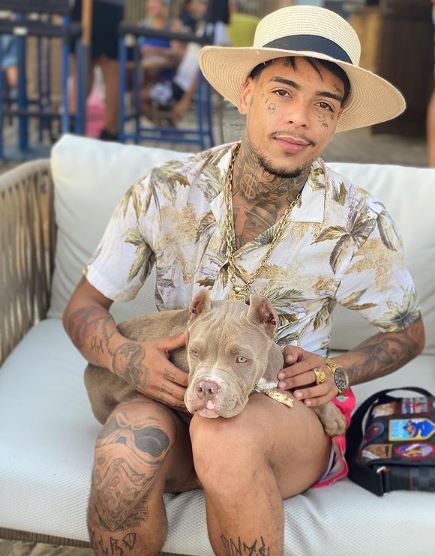 Kevin Nascimento with his pet dog