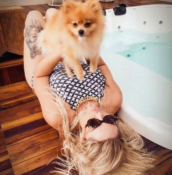 Lucene Duarte and her pet dog Jussara
