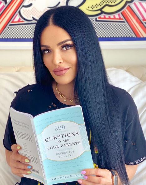 Mona Kattan reading her favorite book