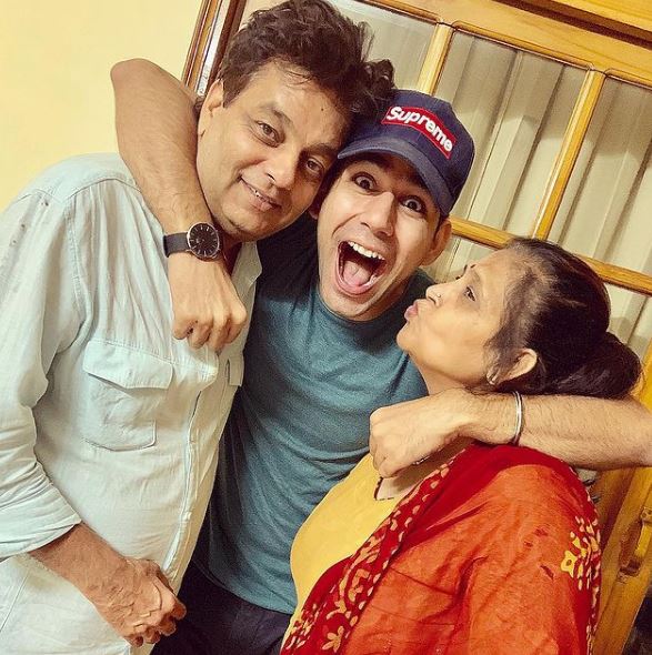 Rishi Dev with his parents