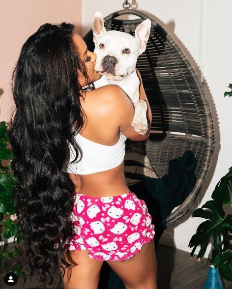 Rosa Acosta with her dog Mccoy Acosta