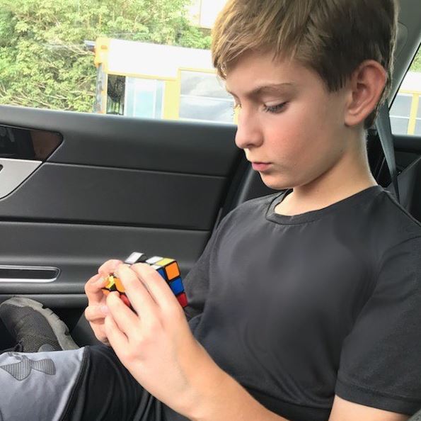 Sawyer Sharbino solving the rubix cube
