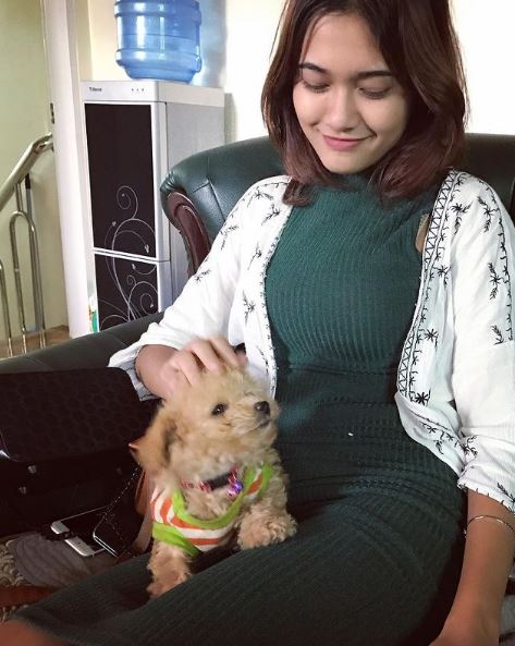 Thuzar Wint Lwin with her dog