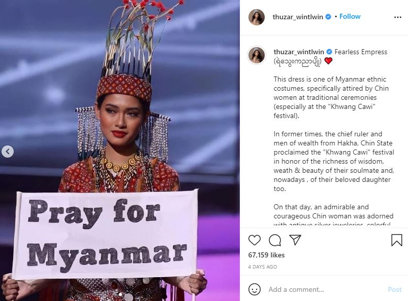 Thuzar Wint Lwin's Pray for Myanmar sign during costume show