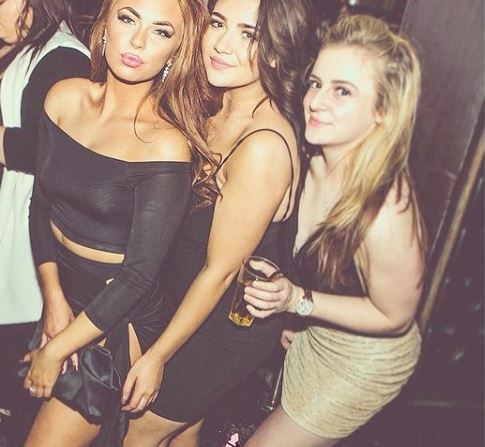 An old photo of Demi Jones with her besties