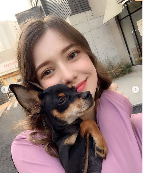 Anastasia Cebulska with her pet dogAnastasia Cebulska with her pet dog