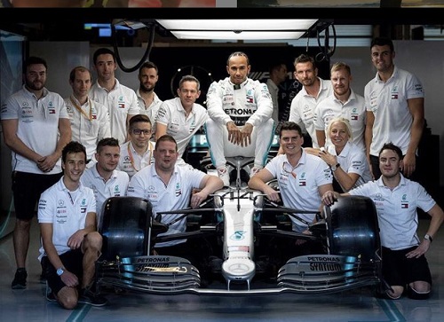 Angela Cullen photographed with her team in 2019
