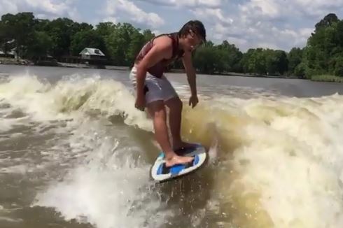 Cale Saurage loves surfing