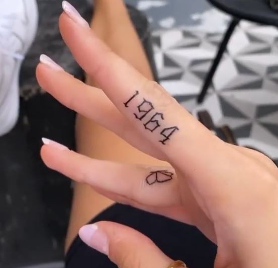 Carly Lawrence tattoos