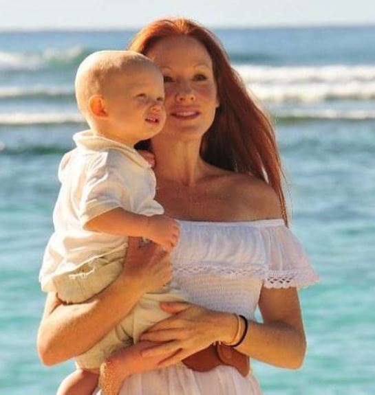 Childhood photo of Christian Convery with his mother
