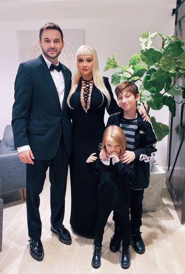 Christina Aguilera with her partner Matthew Rutler and daughter