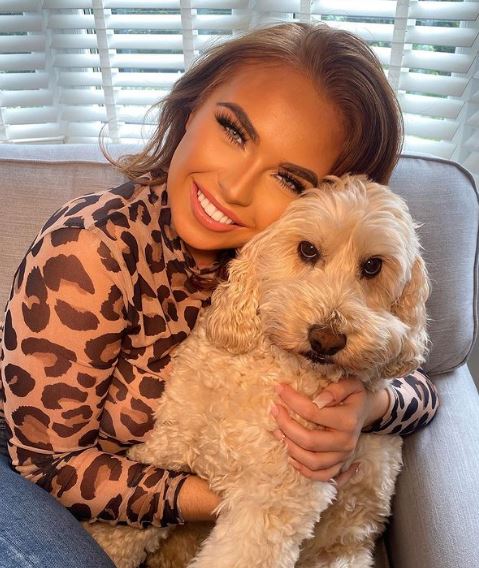 Demi Jones with her pet dog