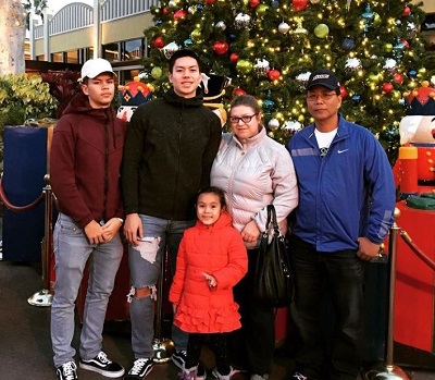 Dwight Ramos with his father, mother, brother and sister