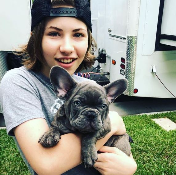 Emmy DeOliveira and her pet dog