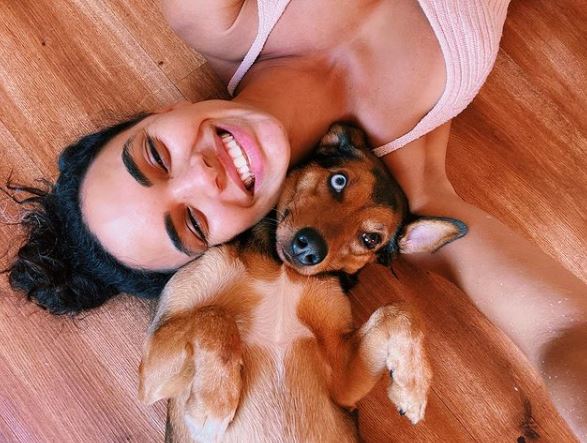 Giovana Cordeiro with her pet dog