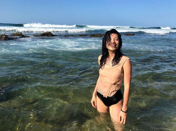Hanako Greensmith at beach
