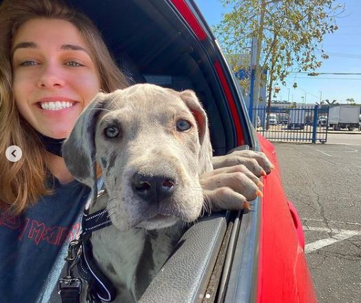 Isabella Avila aka Onlyjayus with her pet dog