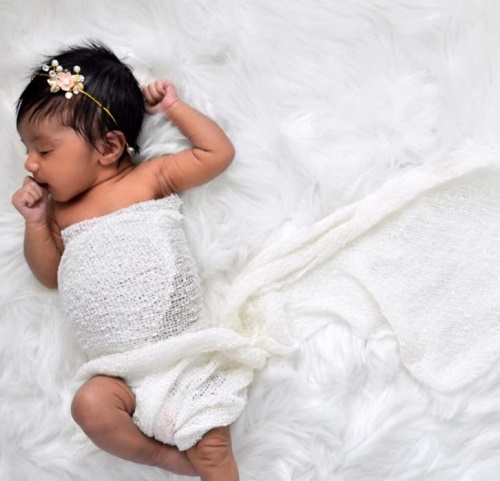Kashe Quest was clicked when she was a newborn