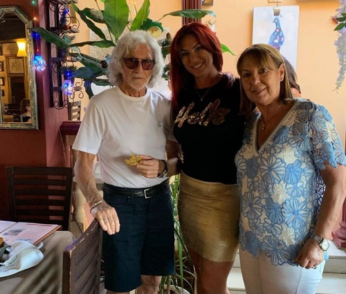 Lauren Simon photographed with her parents Alan Goldstone and Petula