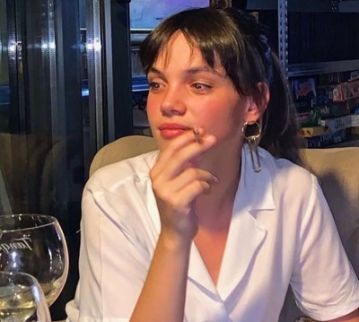 Martina Cariddi occasionally does smoking and drinking