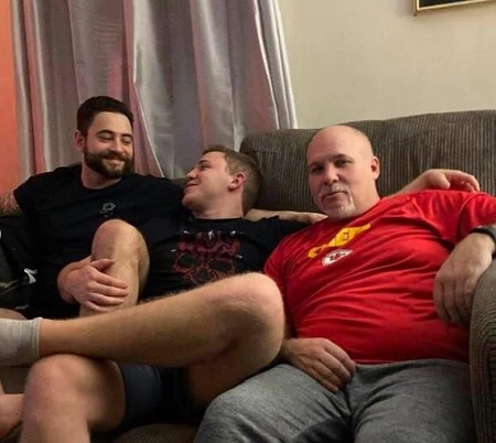 Michael Cammett with his sibling MIke and father