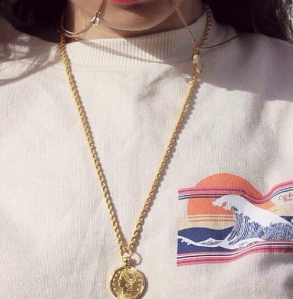 Mylène Jampanoï likes to wear pendants