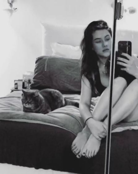 Mylène Jampanoï with her cat