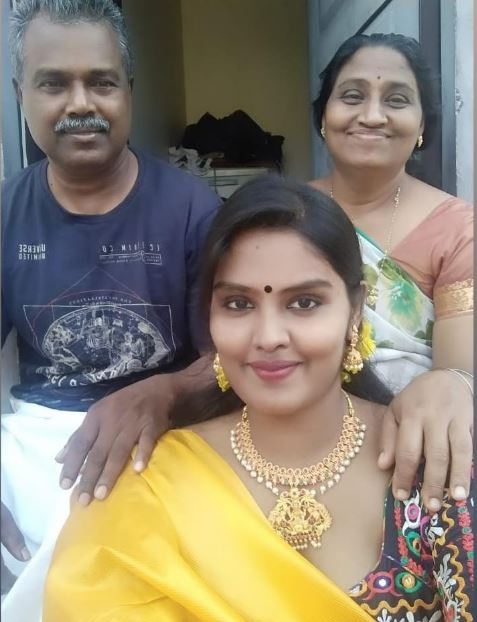 Revathy Sampath with her father Sampath Kumar and mother Priya Sampath